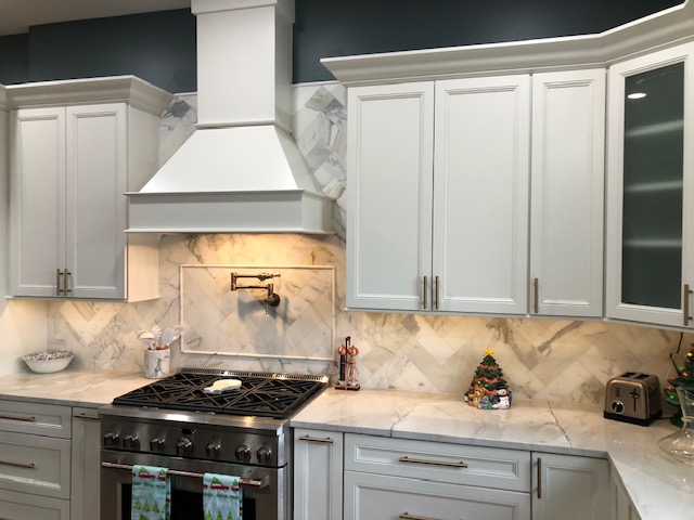 white cabinets with gold pulls