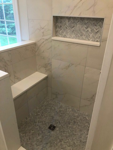 sit in shower with custom tile work