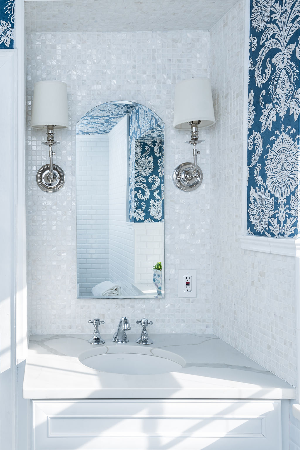 mosaic tile wall above sink